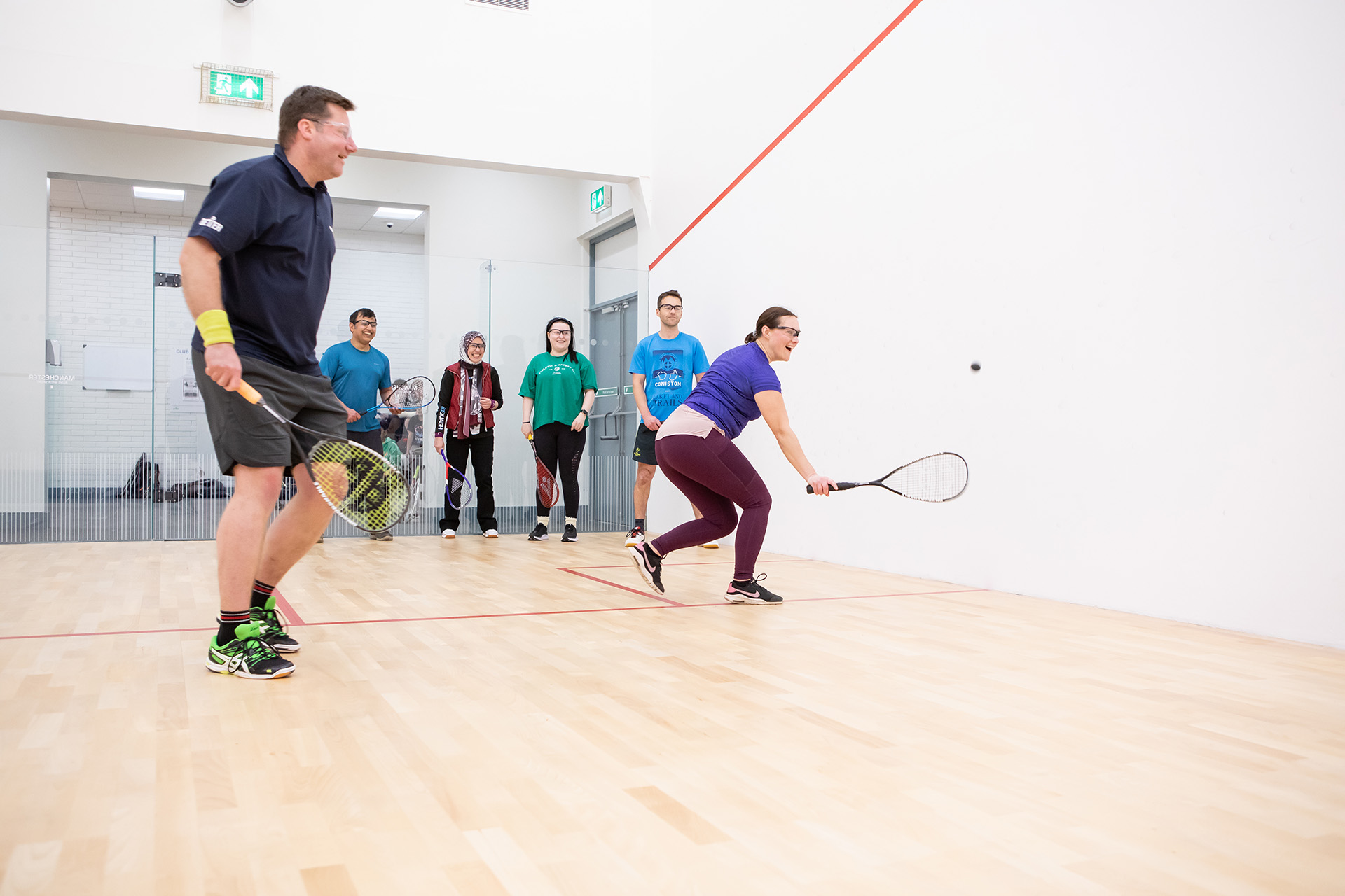 people playing squash